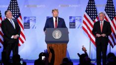 Trump declares NATO a 'fine-tuned machine' at end of summit