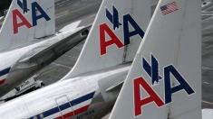 American Airlines apologizes after booting mother and baby with dry skin condition