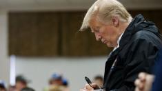 Trump signed Bibles, many religious leaders say they understand
