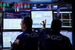 Dow drops at open, technology stocks boost Nasdaq