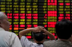 Global stocks fall as trade row intensifies, dollar wobbles