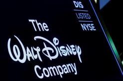 U.S. gives Disney approval to buy Fox amid bidding war with Comcast