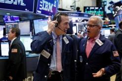 Wall Street opens lower as Amazon buy hits drug stocks