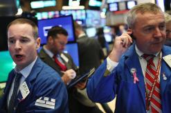 Dow futures dip on trade concerns despite Apple boost