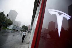 Tesla steadies output of new Model 3 sedan, sees a profit