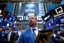 Tech gains push Wall St. higher, offsets Turkey currency worries