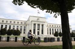 Powell sets Fed's course with data-based judgment
