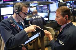 Wall Street opens lower as trade jitters weigh
