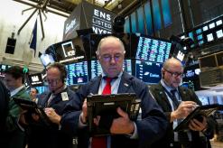 World stocks, Wall Street surge after US vote but dollar takes hit