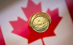 Canadian dollar dips as oil falls, investors demand greenbacks