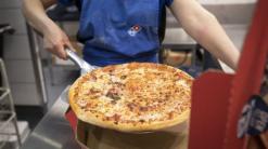 Domino's shares skid 9% after same-store sales growth disappoints