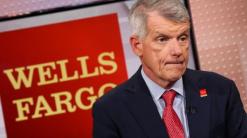 Wells Fargo officials make record $240 million settlement over bogus accounts