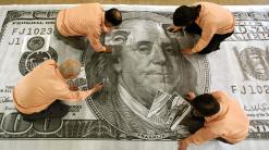 Currencies: Dollar strengthens after economic data