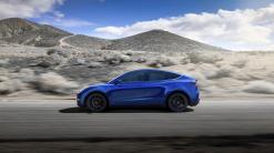 Tesla’s Elon Musk unveils Model Y crossover, with $47,000 price tag