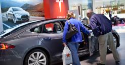 Cowen lowers Tesla price target to $180 and says Model 3 deliveries could be weaker than expected