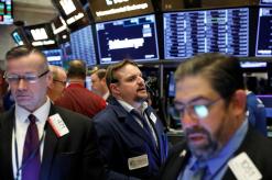 Wall Street opens flat as growth worries linger, trade talks in focus