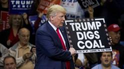 Trump loves coal, hates climate action but investors are fighting back