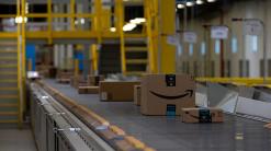 Amazon to give Prime customers one-day shipping, cutting free delivery time in half