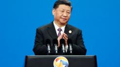 Xi tells world leaders he's committed to reforming China, but provides few details