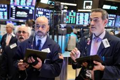 Wall Street slumps at open as trade worries return