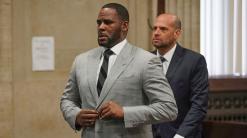 R Kelly girlfriend charged after fight at singer's condo