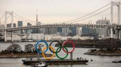 Olympic rings arrive in host city on barge into Tokyo Bay