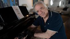 Brazilian piano legend plays again thanks to 'magic' gloves