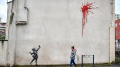 Bansky's Valentine's Day mural covered after it was defaced