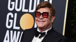 Elton John, sick with pneumonia, cuts New Zealand show short