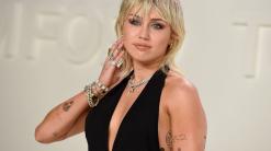 Miley spreads brightness, Stones say home amid coronavirus