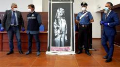 Stolen Banksy honoring Bataclan victims found in Italy