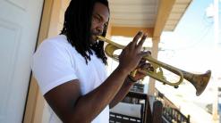 New Orleans musician offers kids trumpets for guns