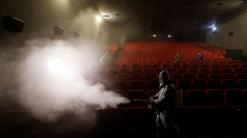 Beijing partly reopens movie theaters as virus declines
