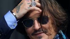Depp's lawyers play video showing Heard 'attacked' sister