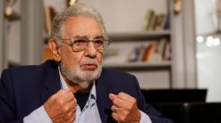 Opera's Domingo denies abusing power, seeks to clear name