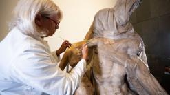 Restorers uncover new details in a Michelangelo Pieta