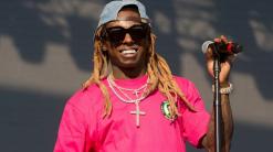 Rapper Lil Wayne charged with federal gun offense in Florida