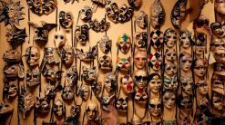 AP PHOTOS: Venice has people in masks but no Carnival fun