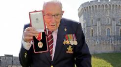 Capt. Tom Moore, UK veteran who walked for NHS, dies at 100