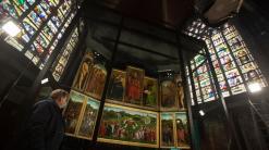 Belgium shows restored masterpiece but stolen panel rankles