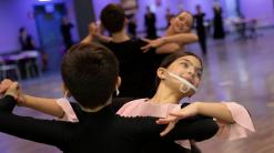 AP PHOTOS: Italy ballroom dancers twirl through lockdown