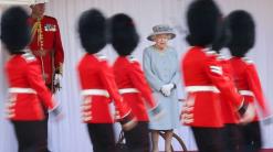 After charming leaders, Queen Elizabeth sits back for parade