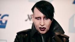 Rocker Manson accused of spitting, blowing snot on woman