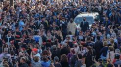 Thousands gather for Crete burial of composer Theodorakis