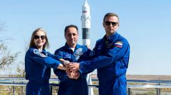 Russian film crew blast offs to make first film in space