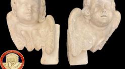 France returns marble angels stolen from Italy church in '89