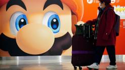 Japanese game maker Nintendo's profits hurt by chips crunch