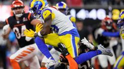 AP PHOTOS: Thrills - and agony - as Rams win Super Bowl