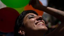 In Rio, even a ban can't keep revelers from Carnival streets