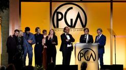 'CODA' gains Oscar momentum with top prize at PGA Awards